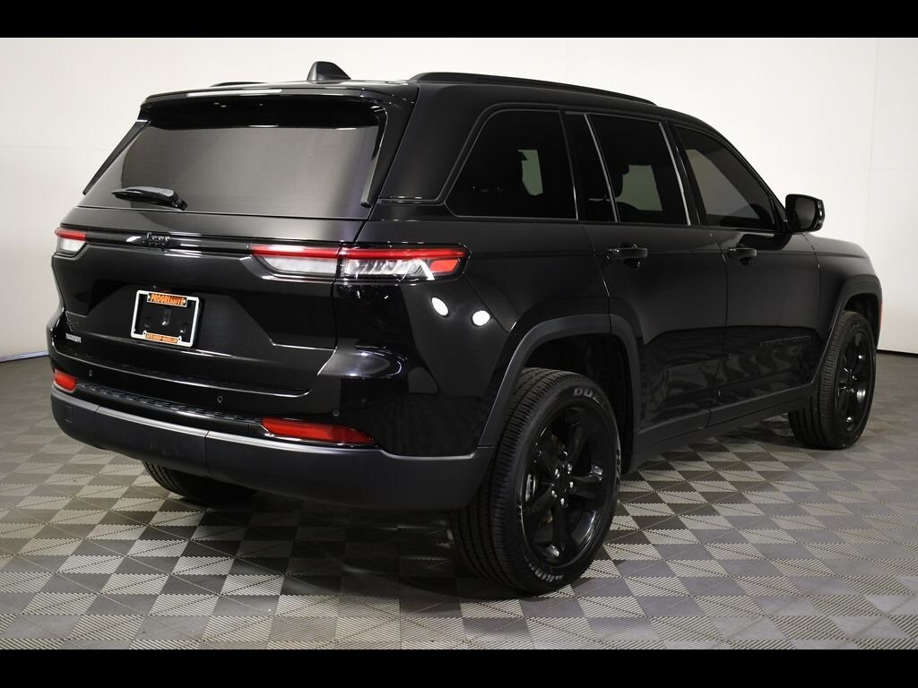 Used 2023 Jeep Grand Cherokee Altitude with VIN 1C4RJHAG2PC594162 for sale in Massillon, OH