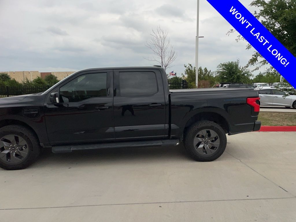 Used 2023 Ford F-150 Lightning Lariat with VIN 1FTVW1EL5PWG06785 for sale in Prosper, TX