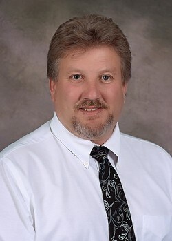 Staff member Joe Collins from ID_9cf45c