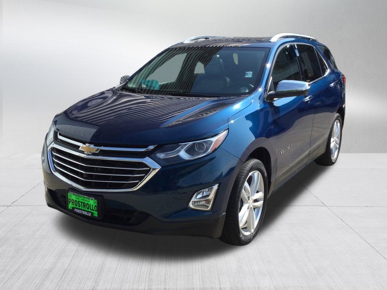 Used 2021 Chevrolet Equinox Premier with VIN 2GNAXXEV3M6152369 for sale in Madison, SD