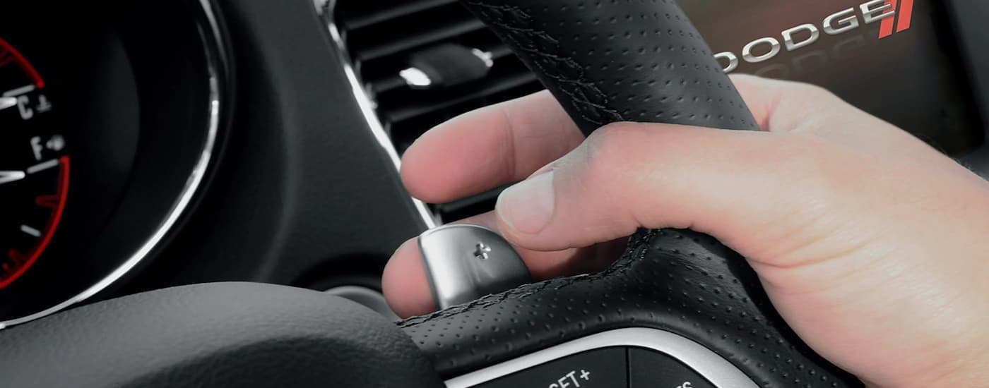 A close up of the paddle shifters in a 2022 Dodge Charger.
