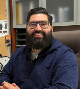 Staff member Chris Paoli-Rodriguez from 5949669ae899