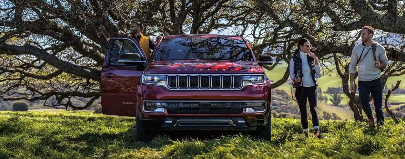 A maroon 2023 Jeep Wagoneer is shown off-road after leaving a Jeep dealer near Lancaster.