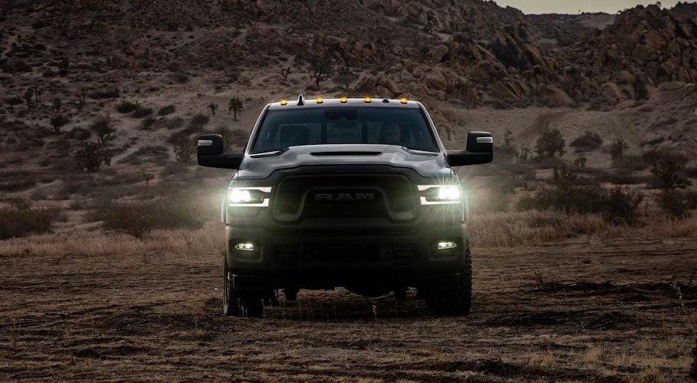 A black 2024 Ram 2500 for sale is shown from the front.