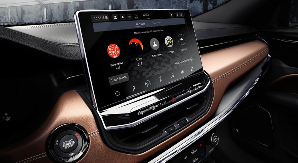 The infotainment screen is shown in a 2024 Jeep Compass.