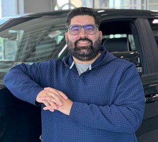 Staff member Chris Paoli-Rodriguez from 5949669ae899