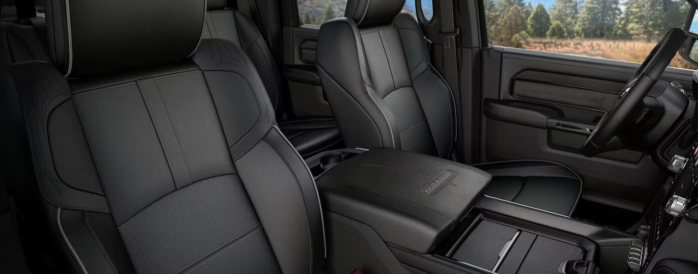 The black interior in a 2024 Ram 2500 Limited is shown.