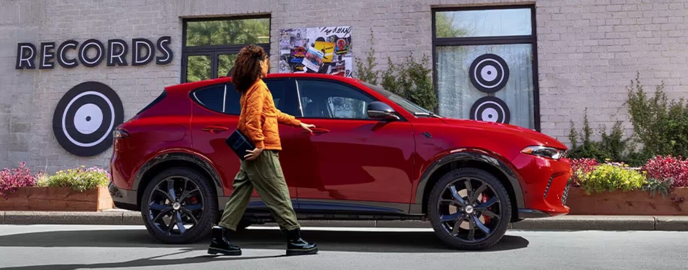 A red 2024 Dodge Hornet is shown after leaving a Dodge dealer near Lancaster.