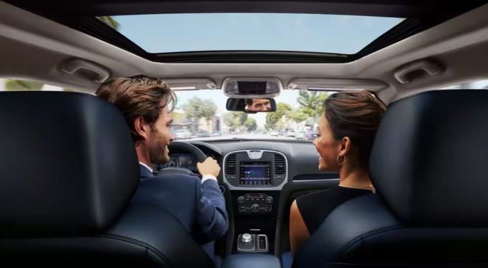 The black interior and dash is shown in a 2023 Chrysler 300.