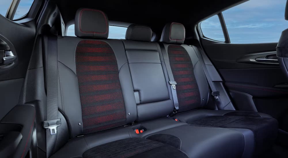 The black and red seating in a 2024 Dodge Hornet at a Dodge Hornet.