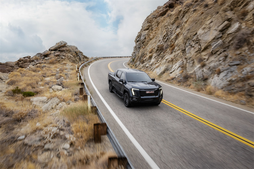 GMC Sierra EV driving with all-electric range