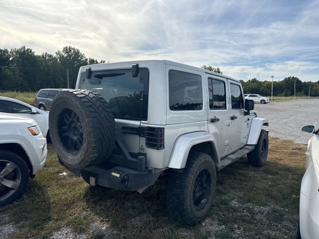 Used 2011 Jeep Wrangler Unlimited Sahara with VIN 1J4BA5H15BL561645 for sale in Pryor, OK