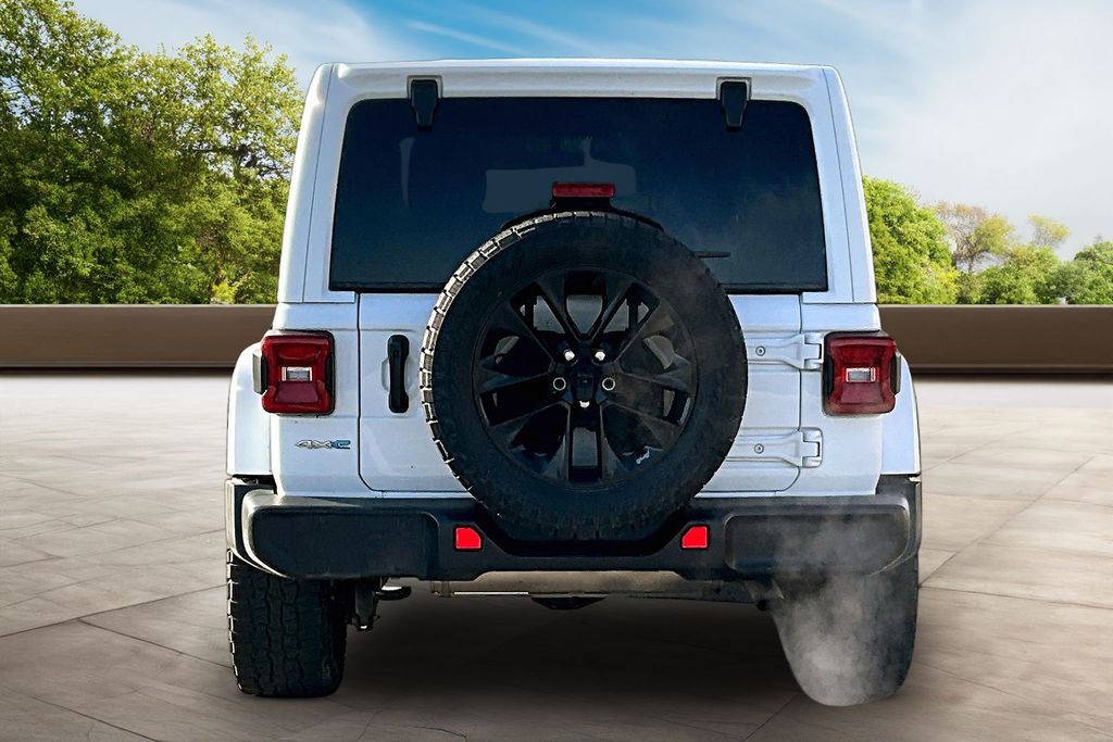 Used 2021 Jeep Wrangler Unlimited Sahara 4XE with VIN 1C4JJXP6XMW847650 for sale in Pryor, OK