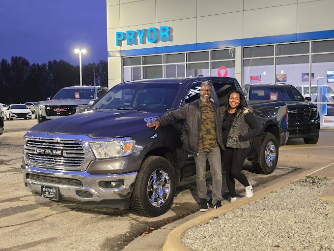Happy family with vehicle bought from Pryor GMC near Sand Springs, OK