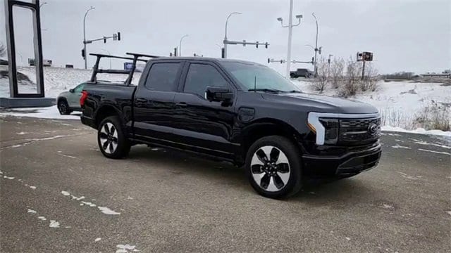 Used 2023 Ford F-150 Lightning Platinum with VIN 1FT6W1EV2PWG28524 for sale in Bismarck, ND