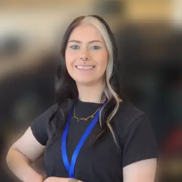 Staff member Abby Sabinash from ID_a5e8ded18c54