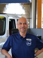 Staff member Larry Abunda from ID_5bc18266419f