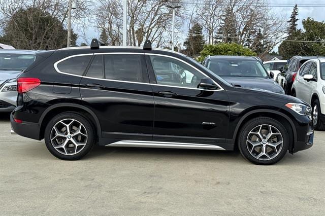 Used 2018 BMW X1 28i with VIN WBXHT3C3XJ5L24274 for sale in Burlingame, CA