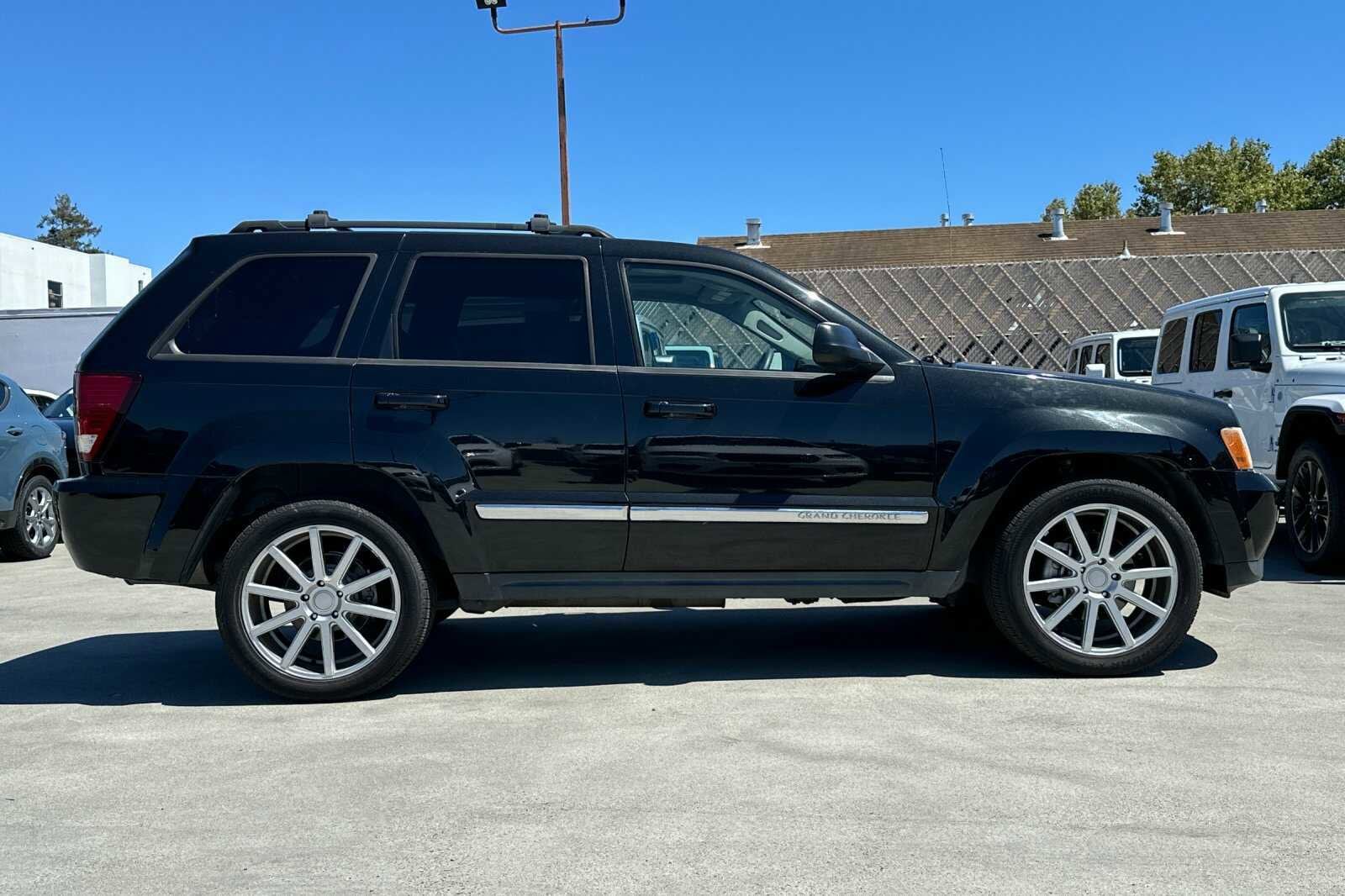 Used 2010 Jeep Grand Cherokee Laredo with VIN 1J4RR4GT9AC148744 for sale in Burlingame, CA