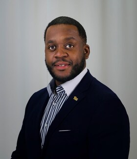 Staff member Claudy Pierre from ID_33f3f1614963