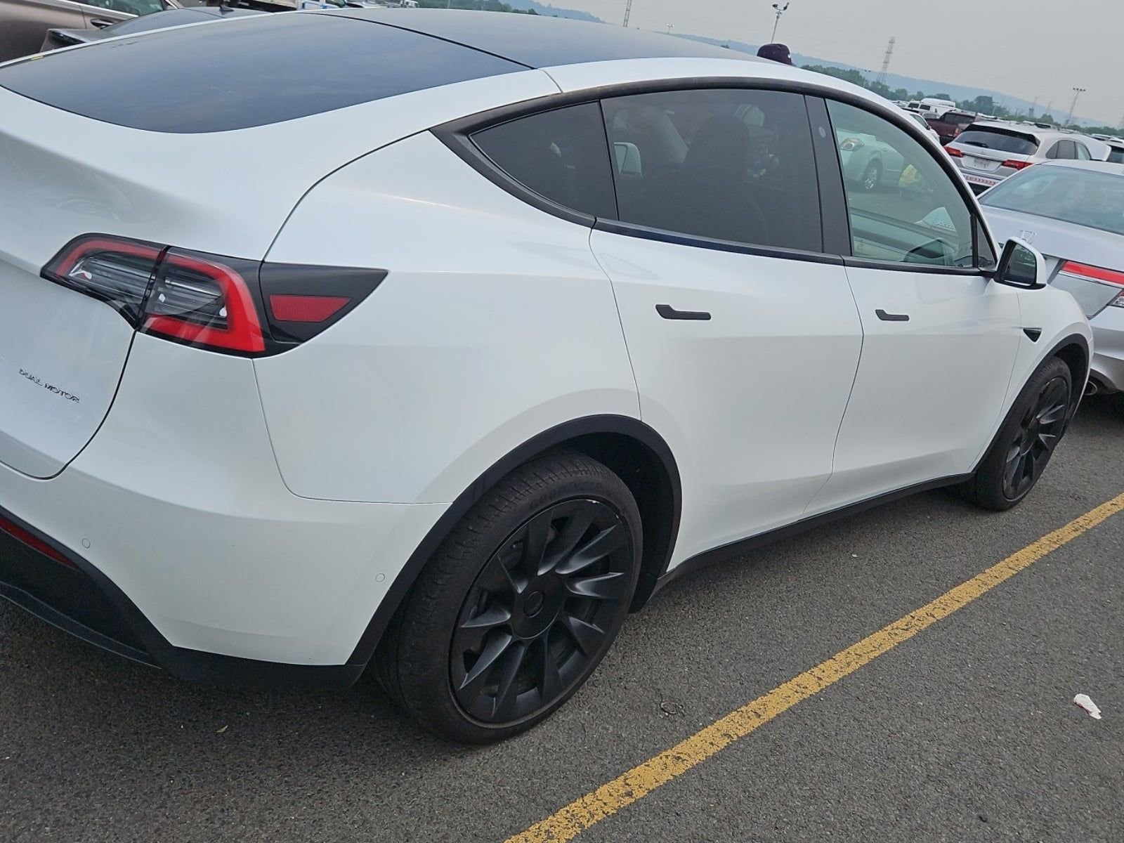Used 2021 Tesla Model Y Long Range with VIN 5YJYGDEEXMF062006 for sale in Northfield, Minnesota