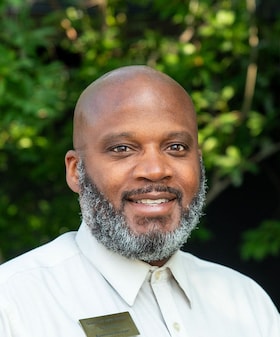 Staff member Tijuan Neal from 153f5c423bb7