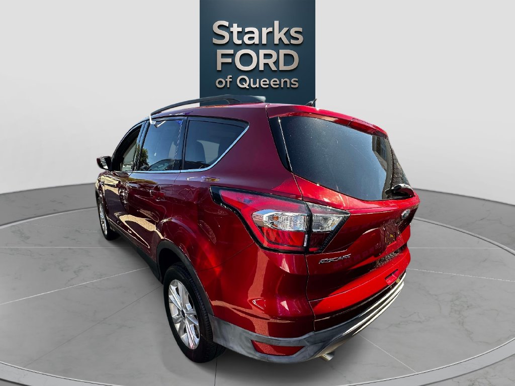 Certified 2018 Ford Escape SE with VIN 1FMCU9GD5JUC53514 for sale in Queens, NY