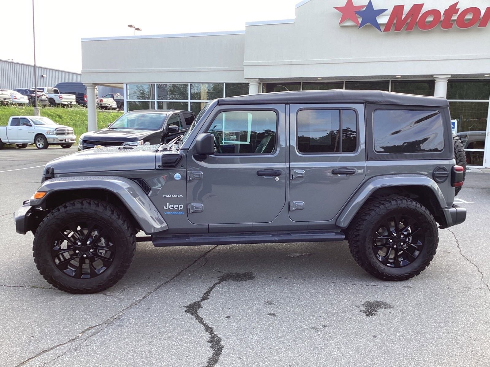 Used 2021 Jeep Wrangler Unlimited Sahara 4XE with VIN 1C4JJXP61MW784390 for sale in Bangor, ME