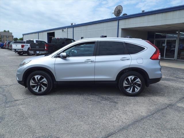 Used 2016 Honda CR-V Touring with VIN 5J6RM3H97GL005215 for sale in Wellington, KS