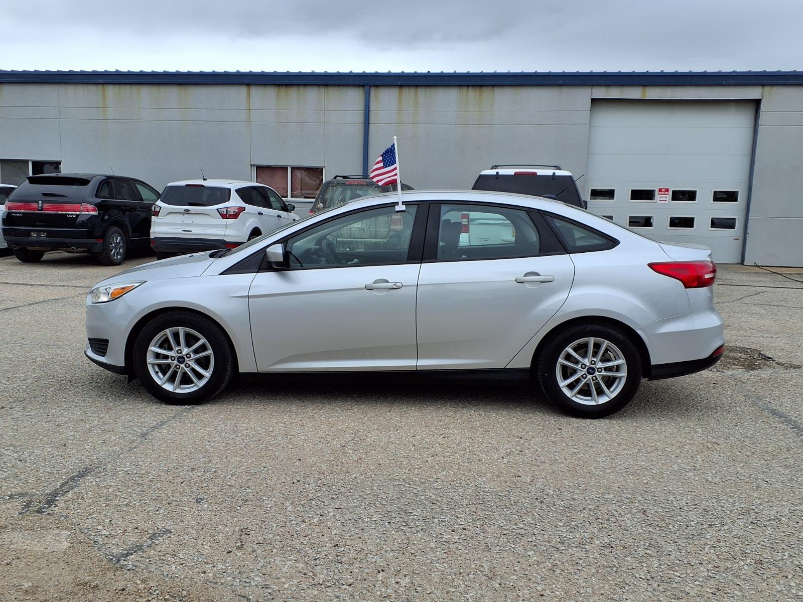 Used 2018 Ford Focus SE with VIN 1FADP3FE3JL226279 for sale in Wellington, KS