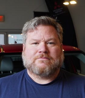 Staff member Joshua Barrere from ID_894c65