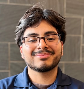 Staff member Christian Camacho from a28dc0442f91
