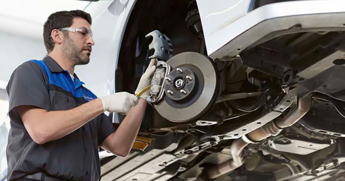 Brakes being serviced as part of a Subaru service schedule