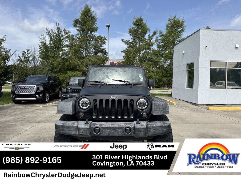 Used 2010 Jeep Wrangler Unlimited Sport with VIN 1J4BB3H1XAL113577 for sale in Covington, LA