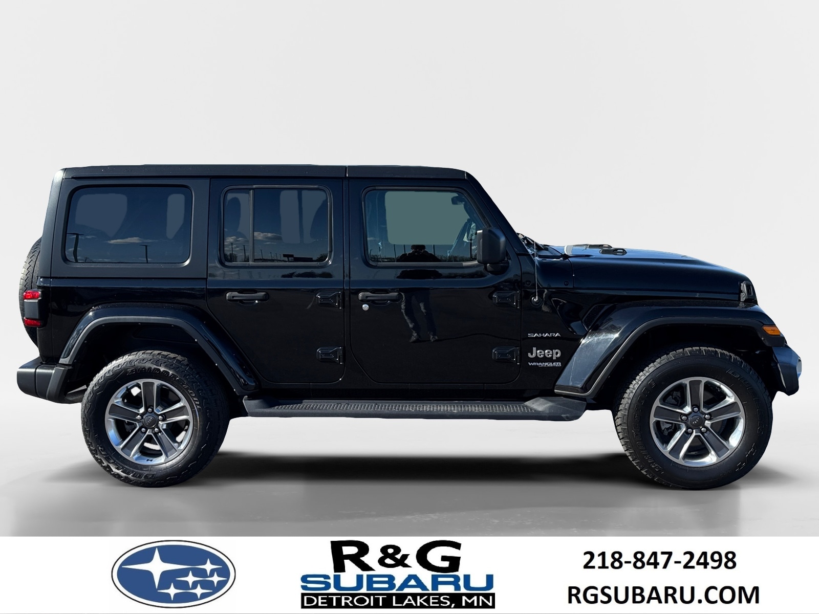 Used 2021 Jeep Wrangler Unlimited Sahara with VIN 1C4HJXEGXMW687733 for sale in Detroit Lakes, Minnesota