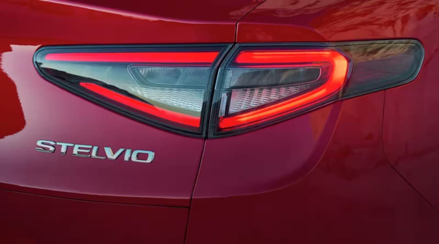 Close-up of the illuminated LED taillight and Stelvio chrome badging on the 2026 Alfa Romeo Stelvio in Ramsey, NJ