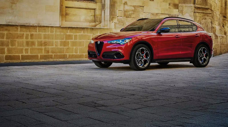 Red 2026 Alfa Romeo Stelvio luxury SUV featuring 280-HP turbo performance and Q4 all-weather traction for Ramsey and Mahwah NJ drivers