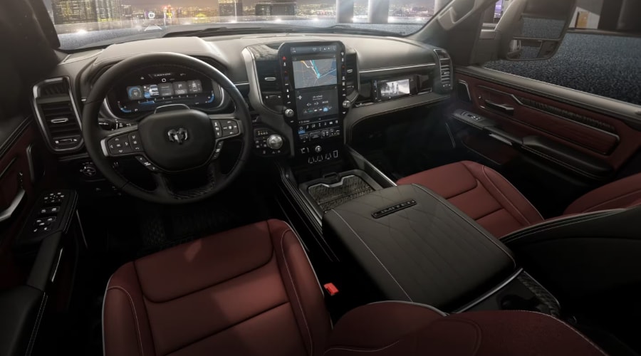 2026 Ram 1500 luxury interior featuring the Uconnect 5 vertical touchscreen navigation system and digital driver display, available at Ramsey CJDR off Route 17 in Bergen County, NJ.