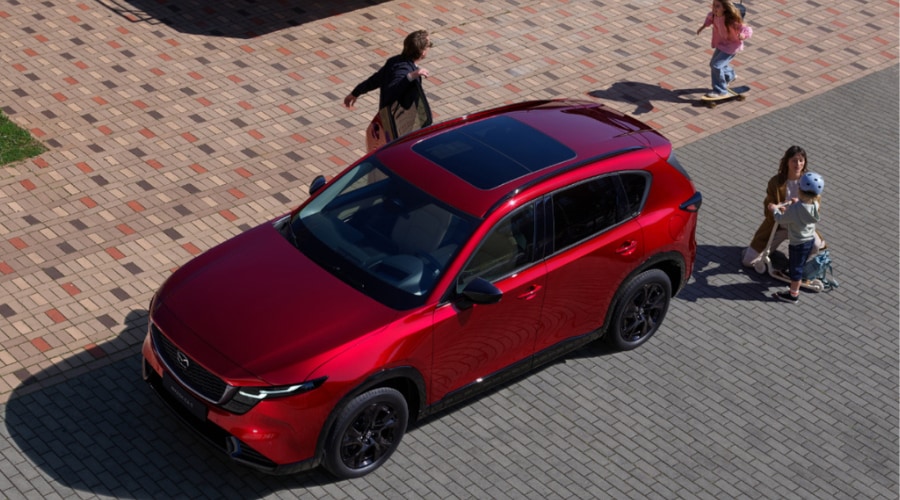 Interior steering wheel details and integrated controls of a 2026 Mazda CX-5, designed to reduce driver distraction on Bergen County roads near Paramus and Mahwah