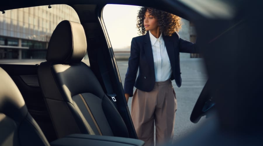 Interior view of a 2026 Mazda CX-90 in Ramsey displaying its premium leather seats and tri-zone climate controls