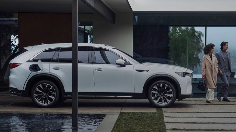 2024 Mazda CX-90 PHEV parked at near Ramsey NJ charging at a home charging station