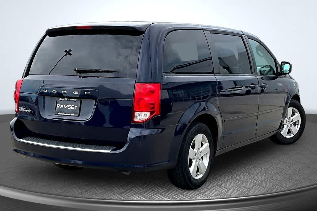 Used 2013 Dodge Grand Caravan SE with VIN 2C4RDGBG8DR534809 for sale in Urbandale, IA