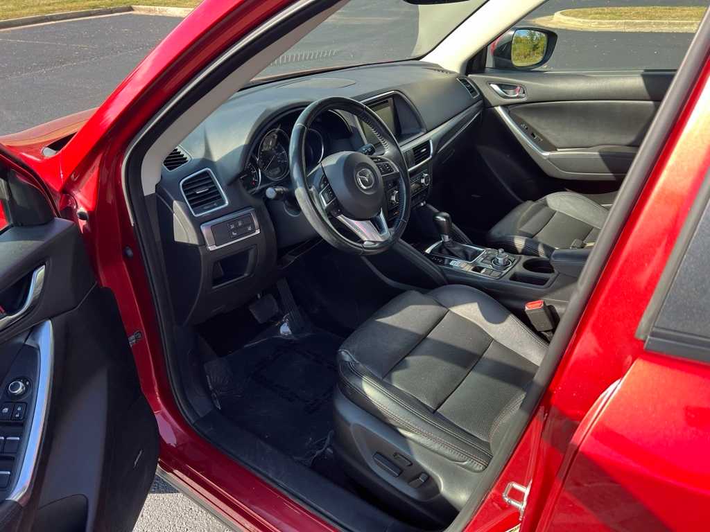 Used 2016 Mazda CX-5 Grand Touring with VIN JM3KE4DY4G0624712 for sale in Urbandale, IA