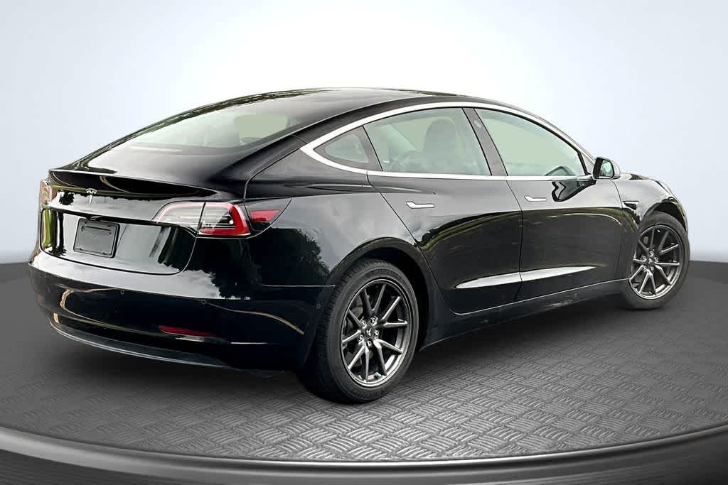 Used 2019 Tesla Model 3 Mid Range with VIN 5YJ3E1EA8KF399976 for sale in Urbandale, IA