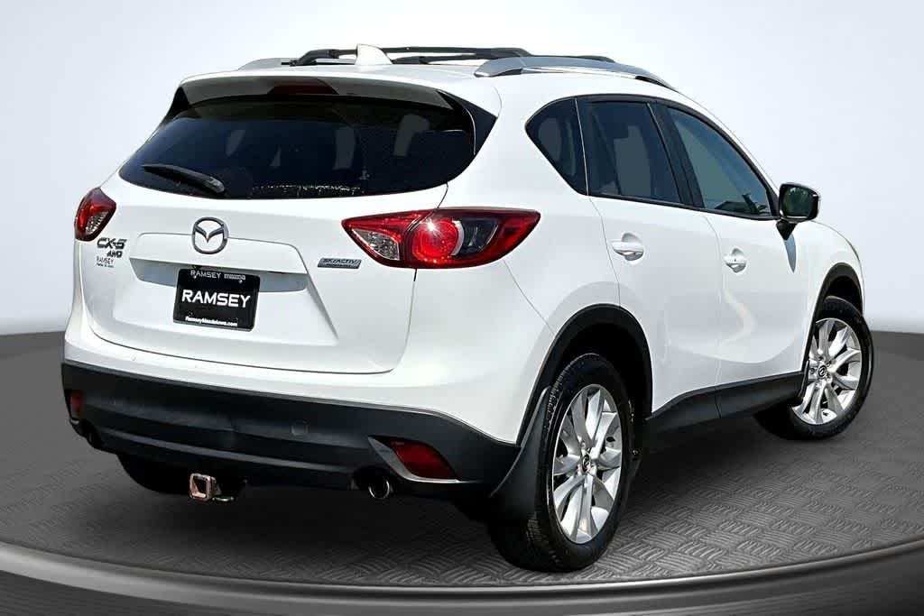 Used 2015 Mazda CX-5 Grand Touring with VIN JM3KE4DY2F0507113 for sale in Urbandale, IA
