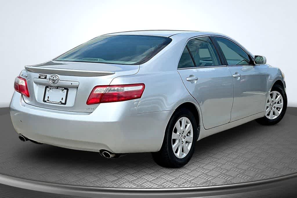 Used 2007 Toyota Camry XLE with VIN 4T1BK46K37U518167 for sale in Urbandale, IA