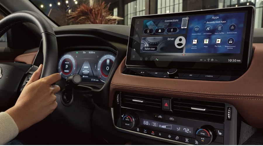Interior view of a 2026 Nissan Rogue showcasing the spacious front dashboard and premium leatherette materials in Ramsey New Jersey