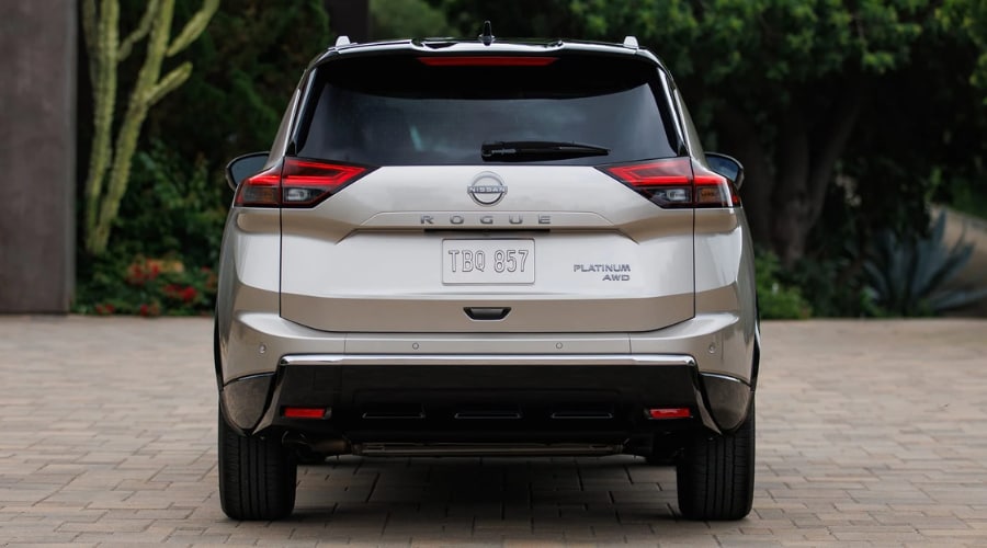 Side view of a 2026 Nissan Rogue in Ramsey showcasing its sleek profile and AWD badging.