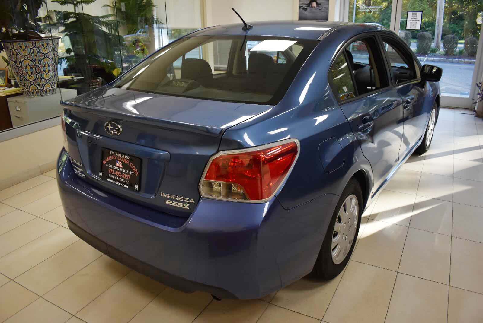 Certified 2015 Subaru Impreza 2.0i Premium 4dr Sedan