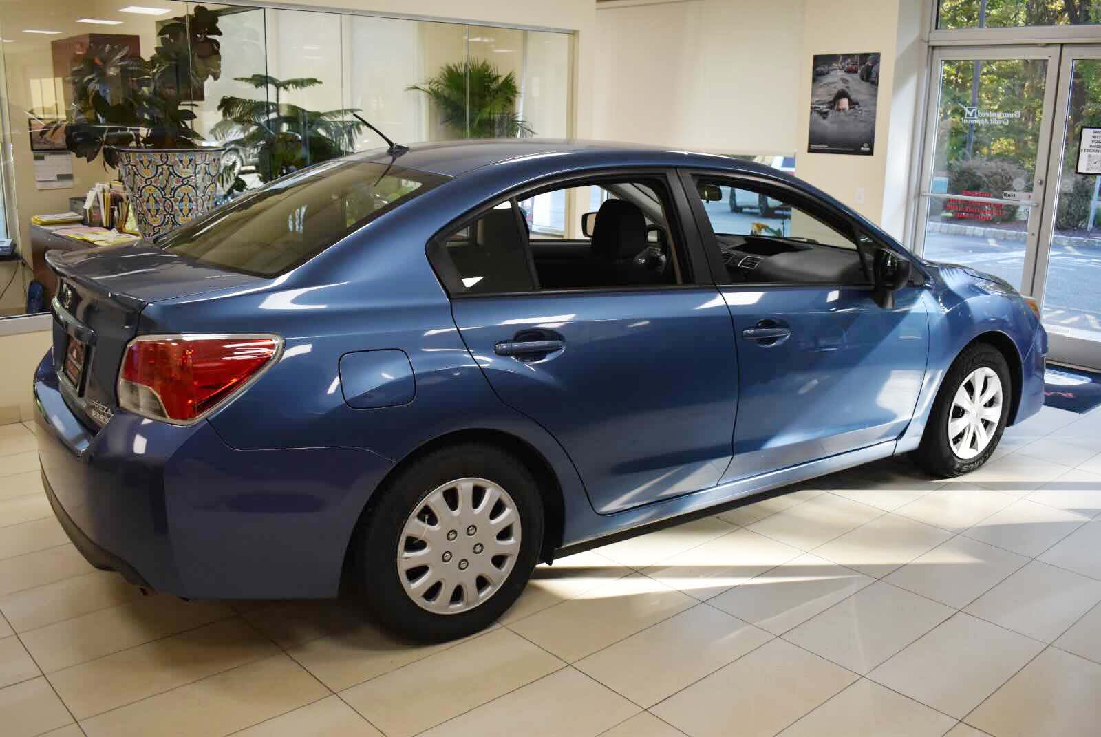 Certified 2015 Subaru Impreza 2.0i Premium 4dr Sedan